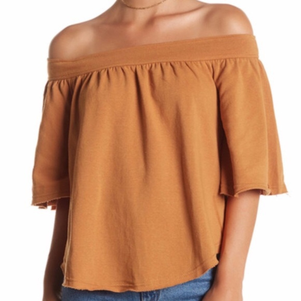Off shoulder sweater.